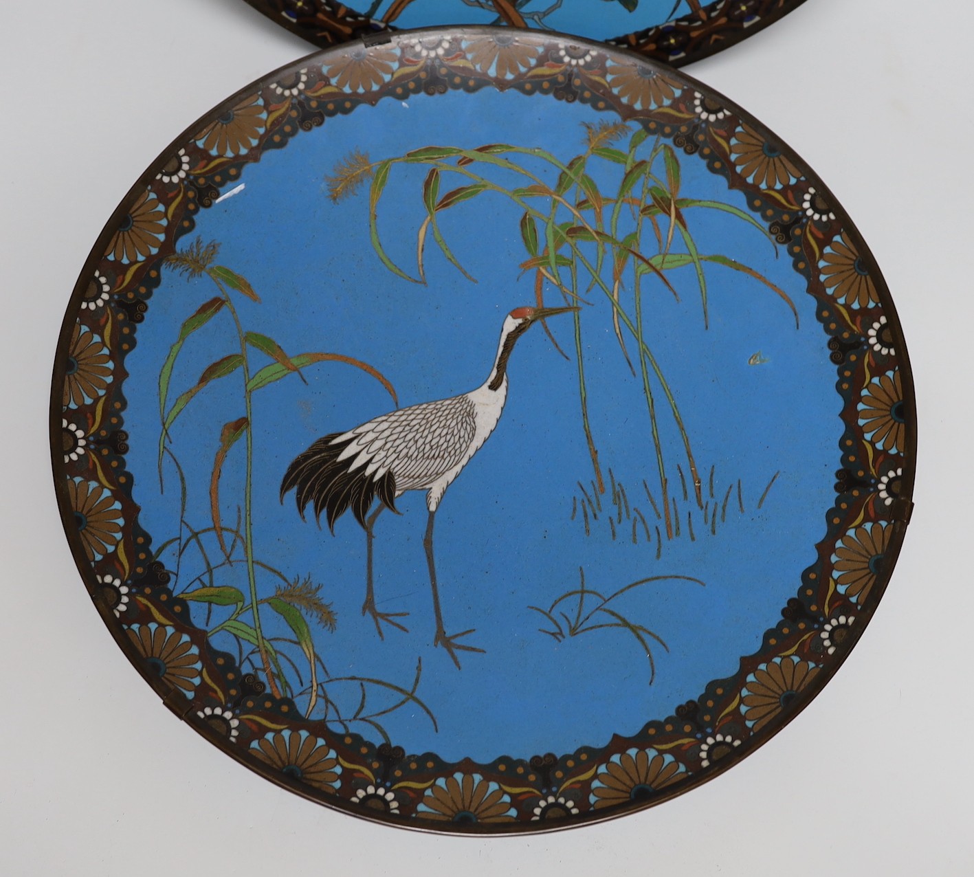 Two Japanese cloisonné enamel dishes, Meiji period, 39cm
